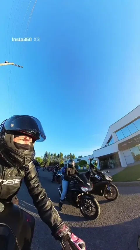 Members of the motorcycle crew filmed with an onboard camera